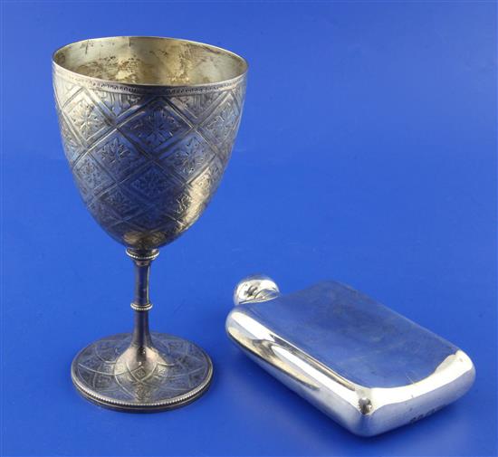 A Victorian engraved silver goblet and a hip flask, 13.5 oz.